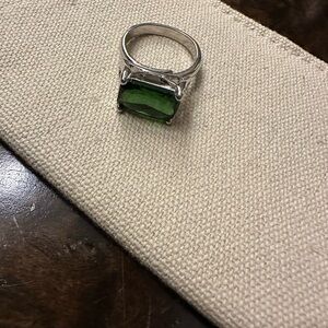 Emerald color silver plated adjustable cocktail ring.